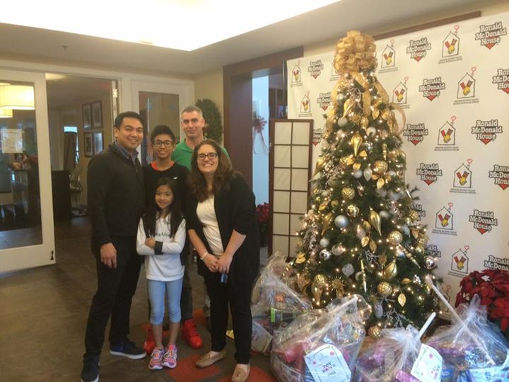 Family at holiday fundraiser event